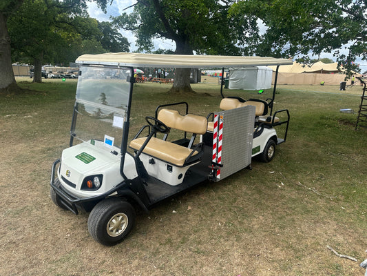 Cushman wheelchair access vehicle used for accessibility at the Wilderness Festival.