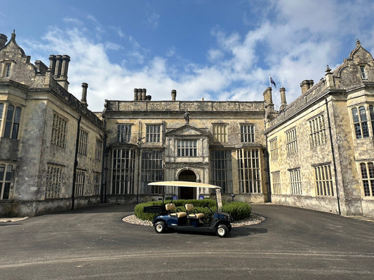 Cushman Shuttle 4 ELiTE parked at Wilton Park, ready for guest transport.