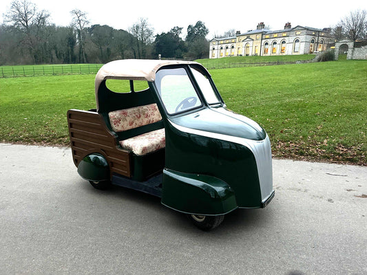 goodwood golf club golf buggy in front of goodwood kennels after being restored